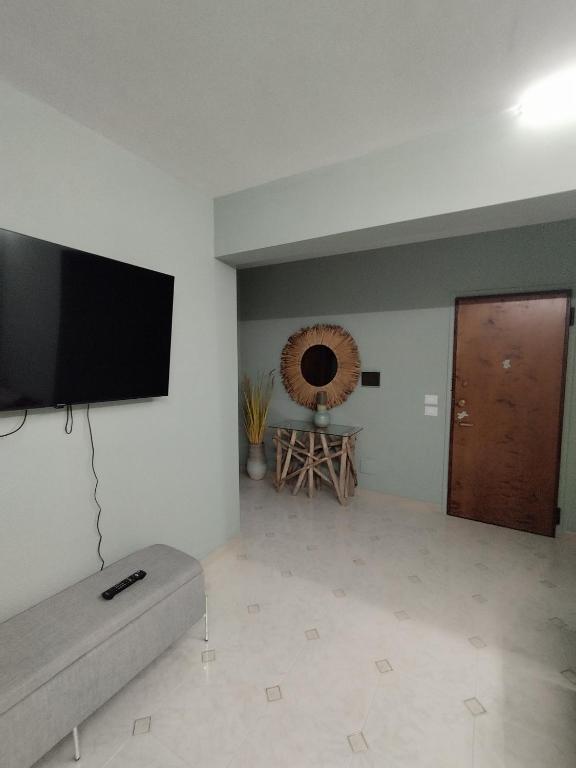 TV a/nebo společenská místnost v ubytování V&J appartamenti