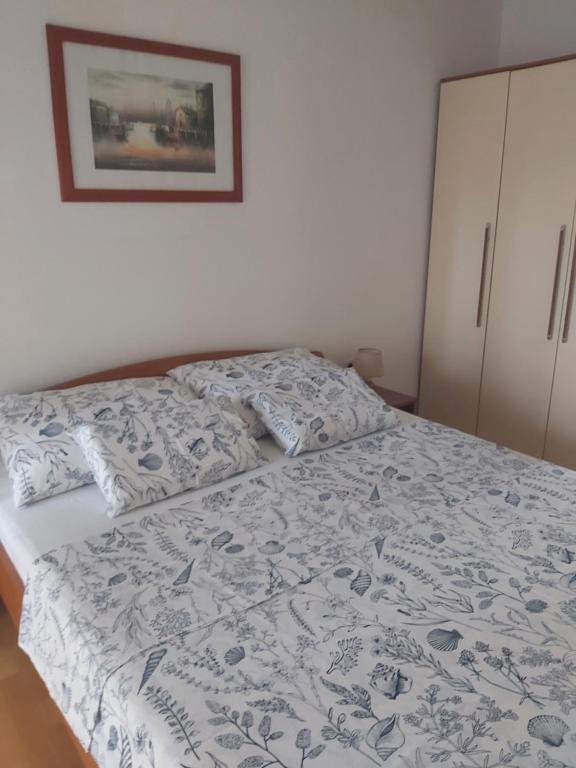 Postel nebo postele na pokoji v ubytování Apartment Lara