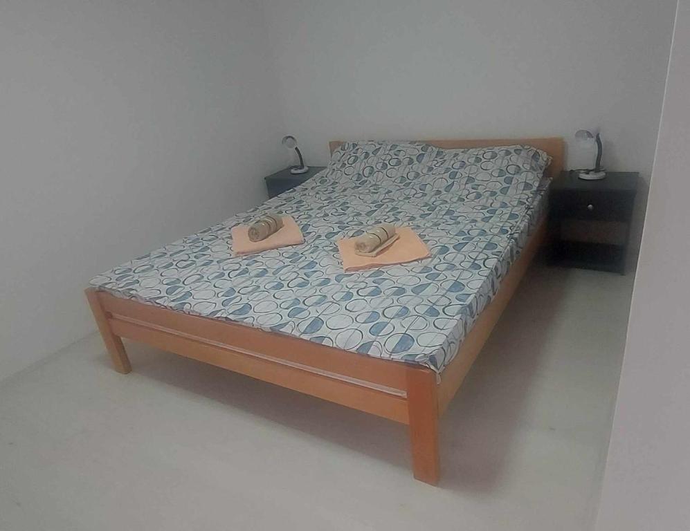 Postel nebo postele na pokoji v ubytování Apartman Miletić