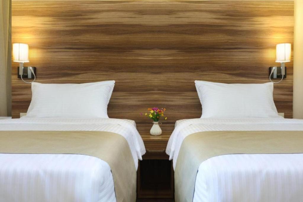 Postel nebo postele na pokoji v ubytování Nacho Hotel Yerevan