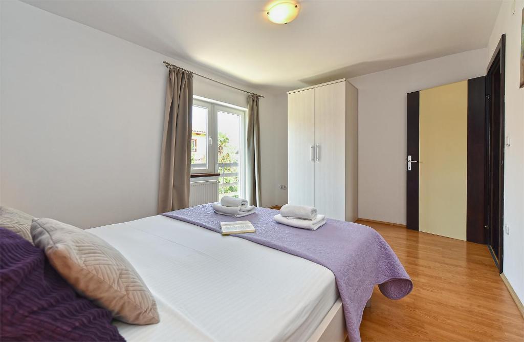 Postel nebo postele na pokoji v ubytování House 2019