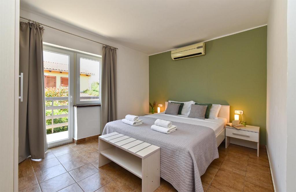 Postel nebo postele na pokoji v ubytování House 2019