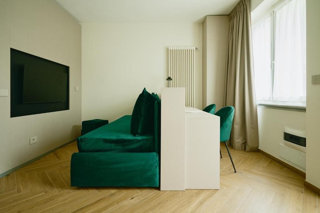 Telewizja i/lub zestaw kina domowego w obiekcie Residence Antico Torchio