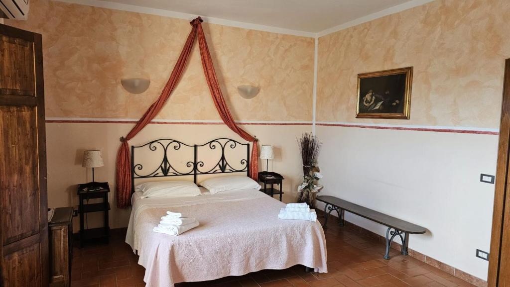 A bed or beds in a room at I Chiari