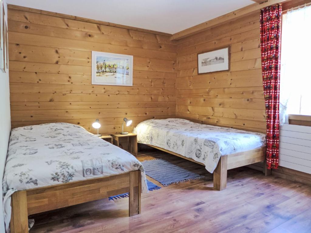 Postel nebo postele na pokoji v ubytování Apartment Chalet Kibou by Interhome