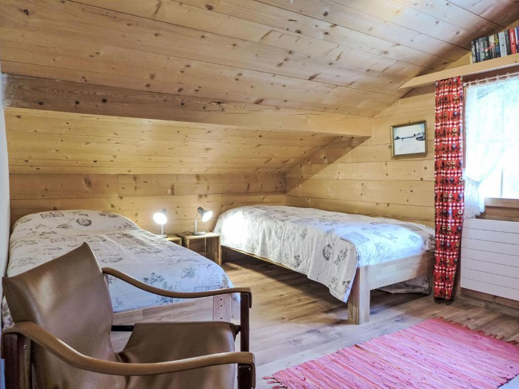 Postel nebo postele na pokoji v ubytování Apartment Chalet Kibou by Interhome