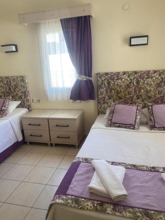 Postel nebo postele na pokoji v ubytování Canna Garden Hotel - Adult Only