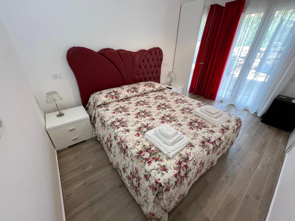Postel nebo postele na pokoji v ubytování Le Castella B&B Restaurant