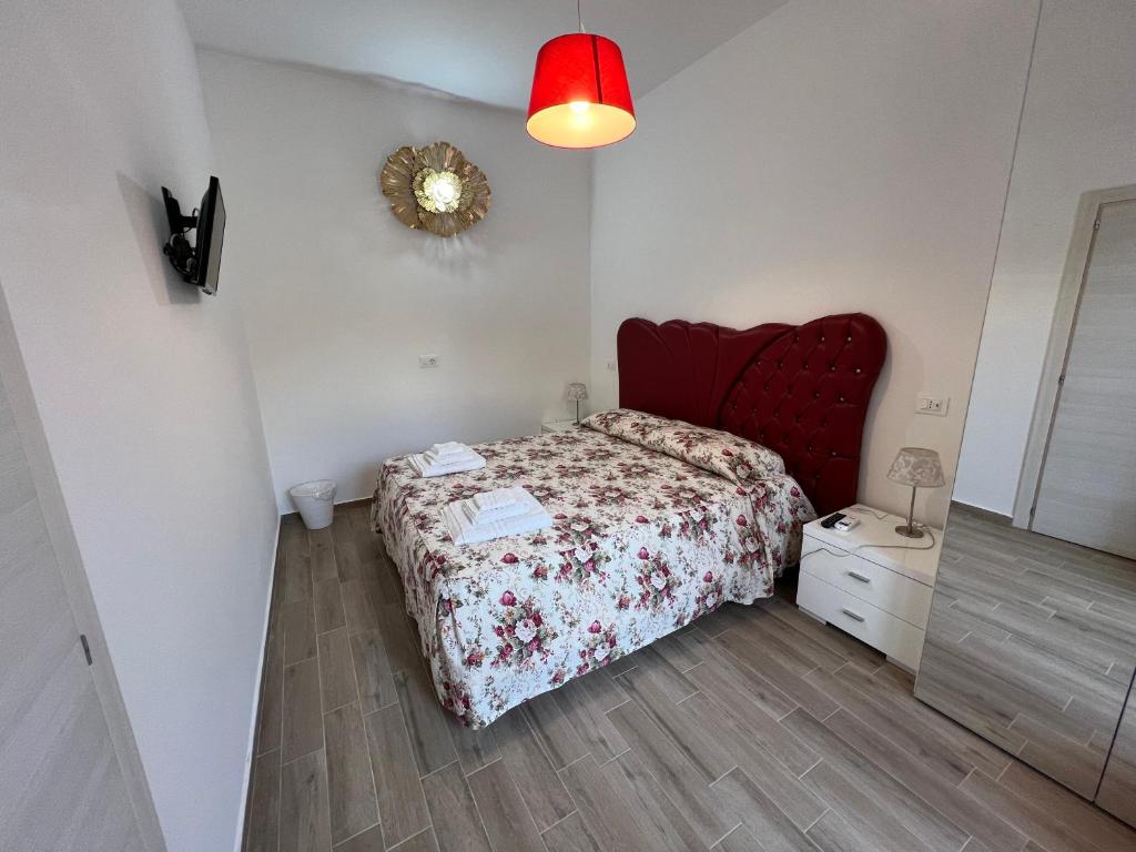 Postel nebo postele na pokoji v ubytování Le Castella B&B Restaurant