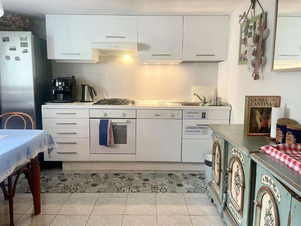 Kuchyň nebo kuchyňský kout v ubytování Casa Lovisoni