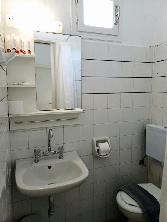 Koupelna v ubytování Εvi Evan Hotel