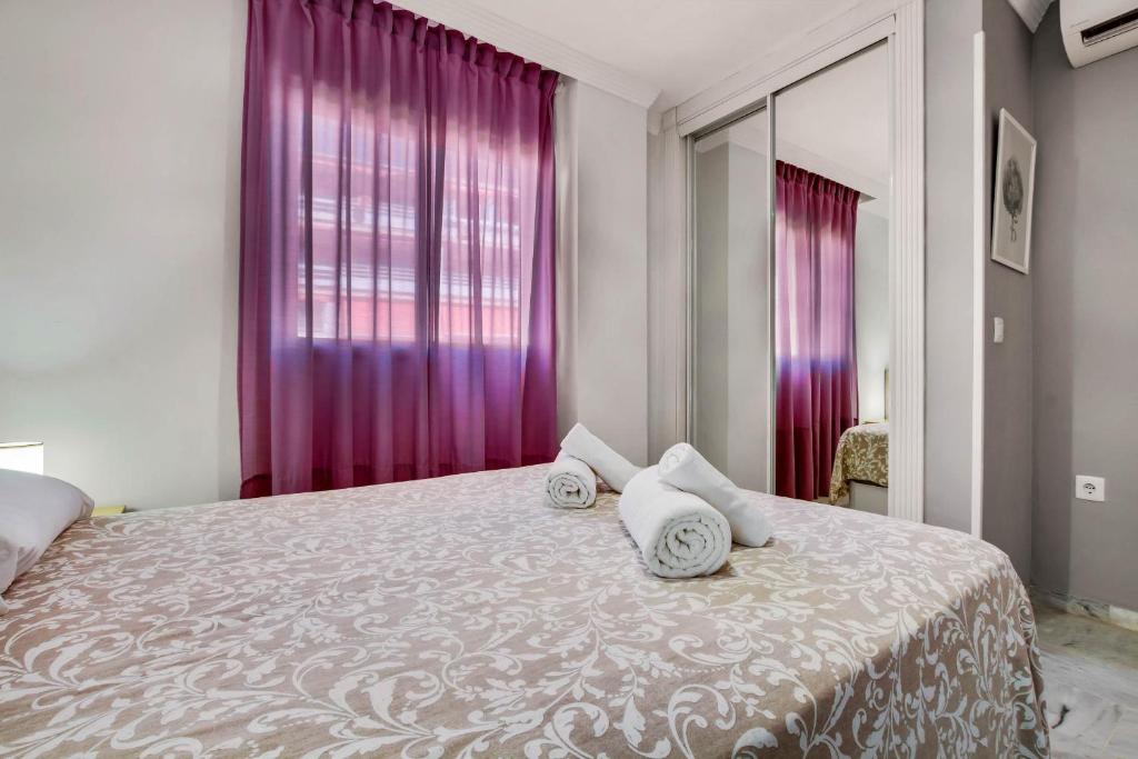 Posteľ alebo postele v izbe v ubytovaní Edificio Granada by IVI Real Estate