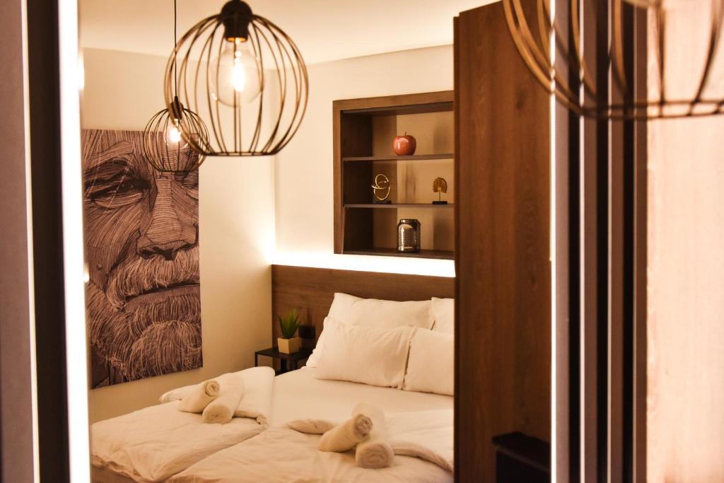 Postel nebo postele na pokoji v ubytování JR Piran B&B