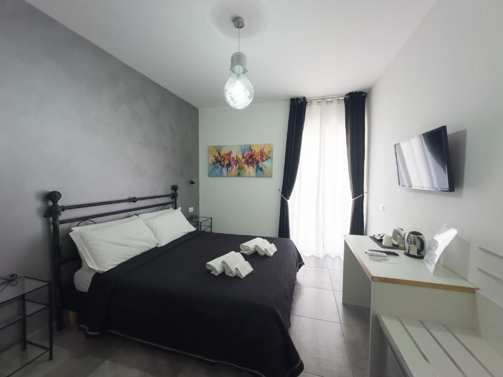 Łóżko lub łóżka w pokoju w obiekcie Four Winds B&B