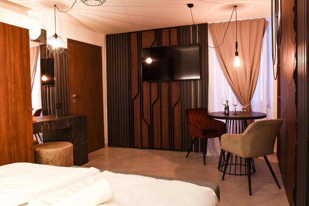 Postel nebo postele na pokoji v ubytování JR Piran B&B
