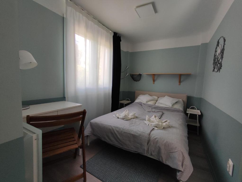 Postel nebo postele na pokoji v ubytování Levélke Mini Apartman