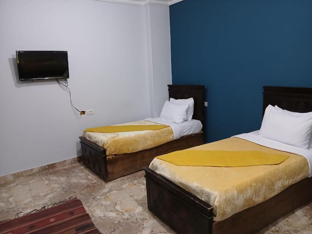 Postel nebo postele na pokoji v ubytování Eastern Oasis Motel & Horse Farm