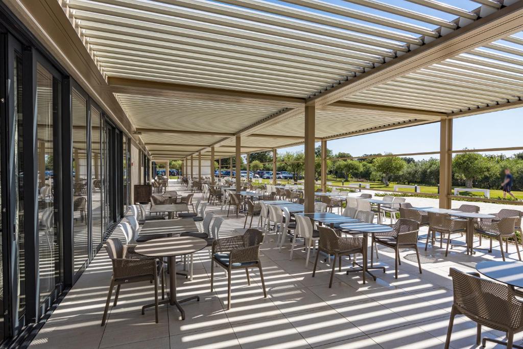 Restoran või mõni muu söögikoht majutusasutuses Residence Del Mar Emotion