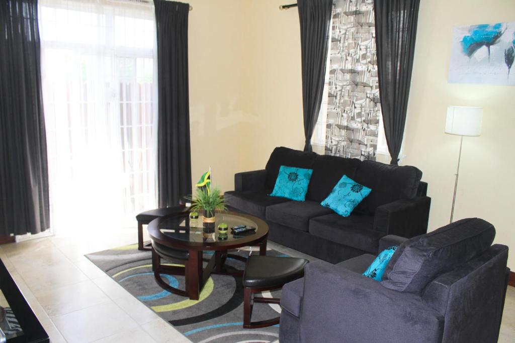 Posezení v ubytování Eclipse Suite Guest Apartment
