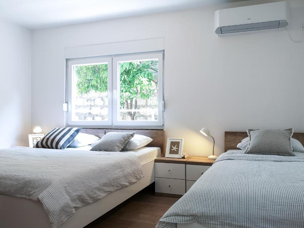 Postel nebo postele na pokoji v ubytování Principessa Rooms