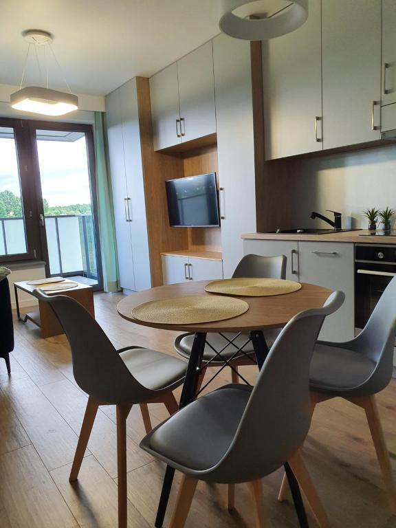 Η κουζίνα ή μικρή κουζίνα στο Apartament Augustów ,Arnikowa