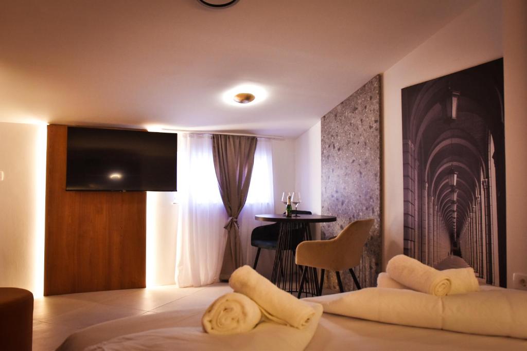 TV a/nebo společenská místnost v ubytování JR Piran B&B