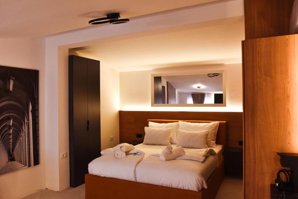 Postel nebo postele na pokoji v ubytování JR Piran B&B