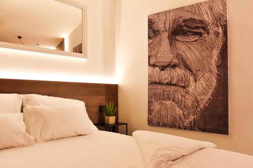 Postel nebo postele na pokoji v ubytování JR Piran B&B