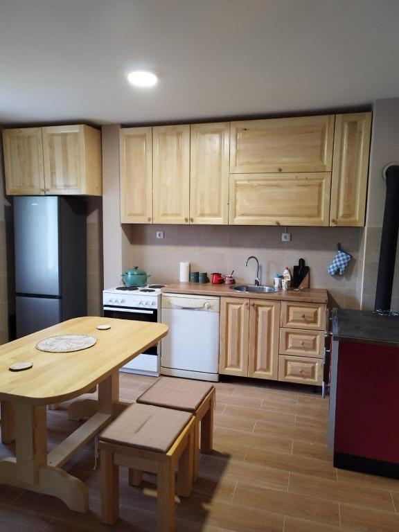 Kuchyň nebo kuchyňský kout v ubytování Wolf Apartments