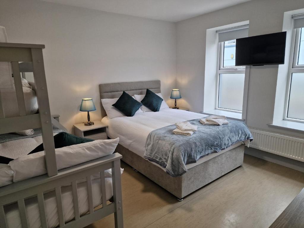 Letto o letti in una camera di Trivia House