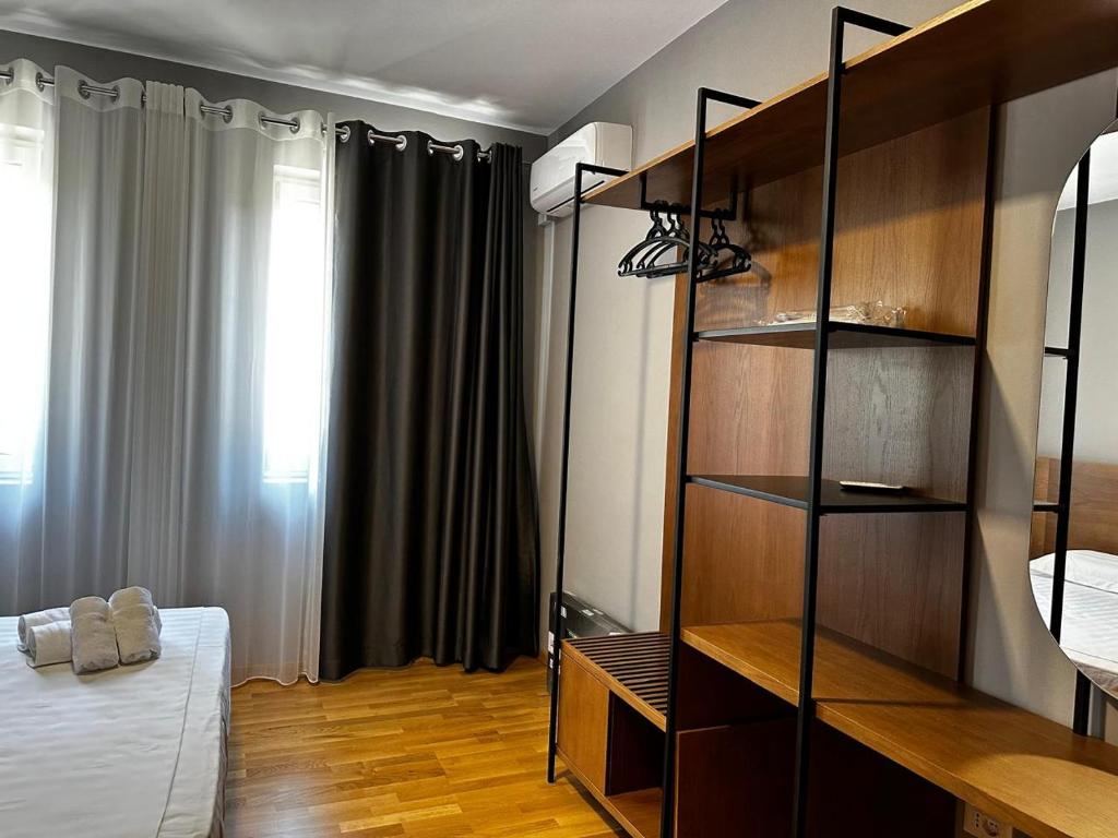 Postel nebo postele na pokoji v ubytování Hotel Rubin