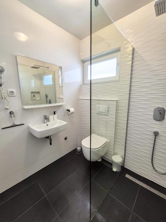 Koupelna v ubytování Principessa Rooms
