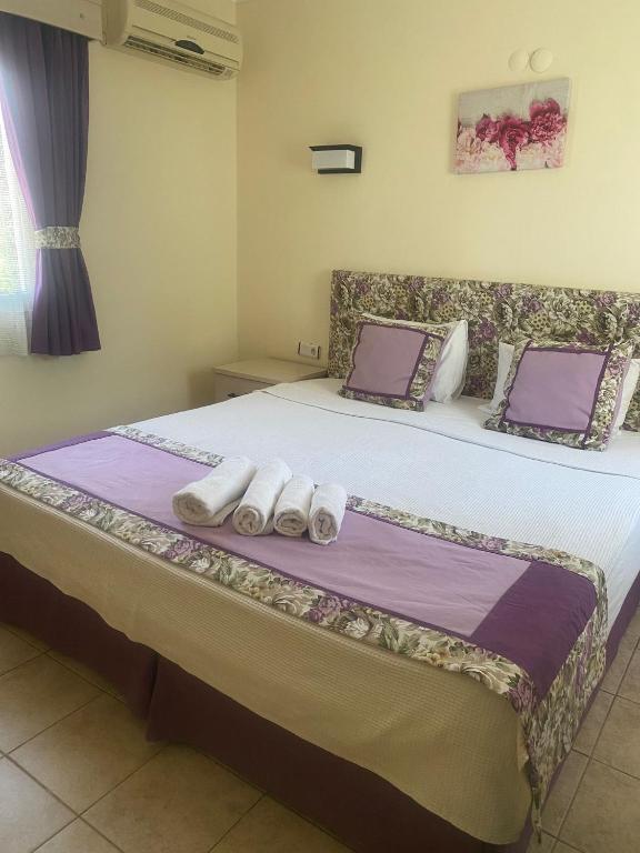 Postel nebo postele na pokoji v ubytování Canna Garden Hotel - Adult Only