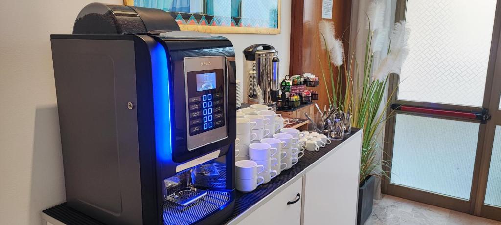 Kuchyň nebo kuchyňský kout v ubytování Hotel STELLA D'ORO