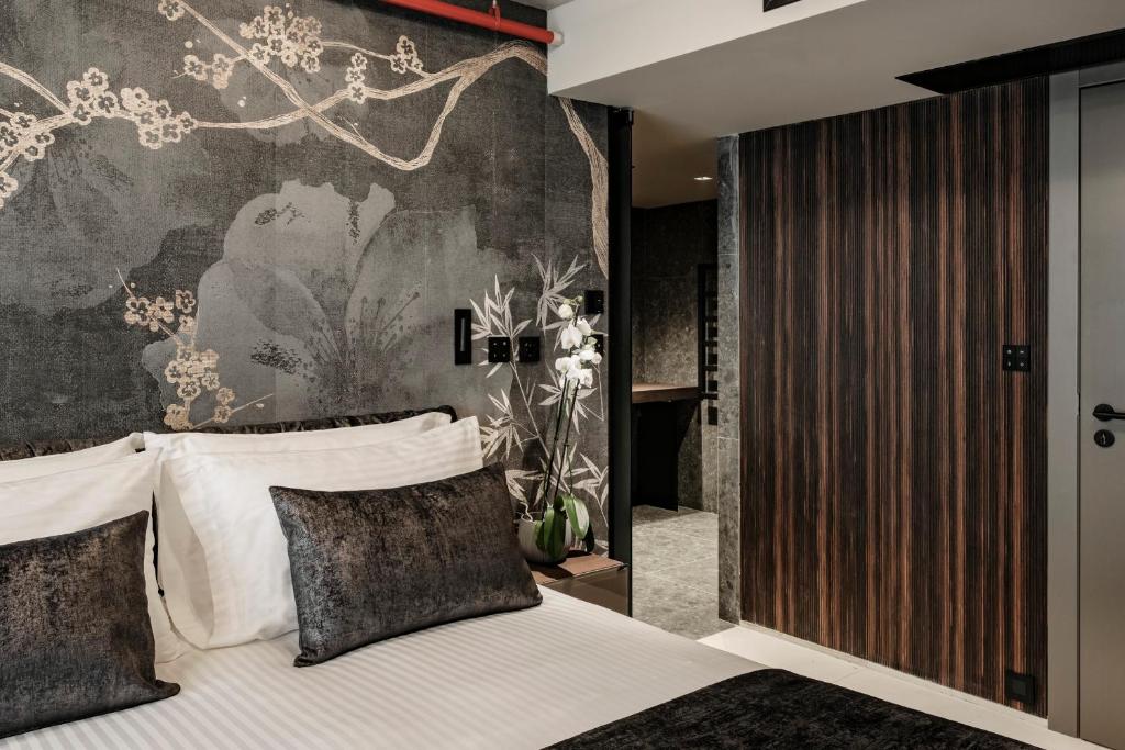 Postel nebo postele na pokoji v ubytování Fitch Hotel