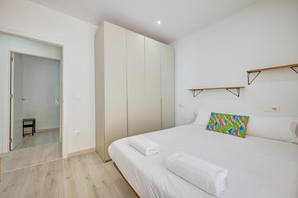 Postel nebo postele na pokoji v ubytování Apartamento Las Terrazas del Ayuntamiento by Clabao