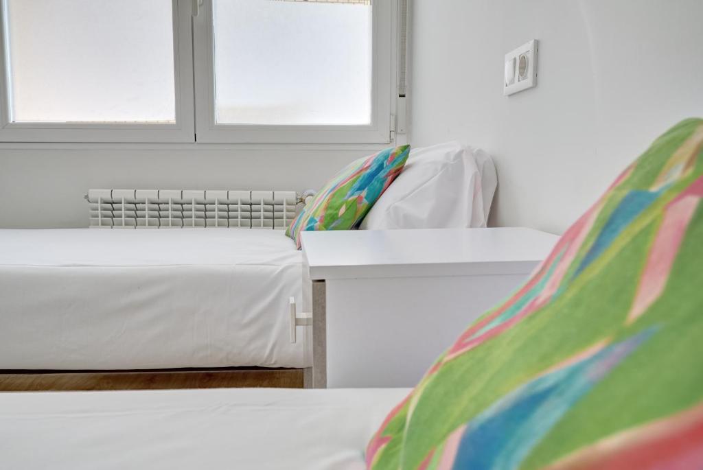 Postel nebo postele na pokoji v ubytování Apartamento Las Terrazas del Ayuntamiento by Clabao