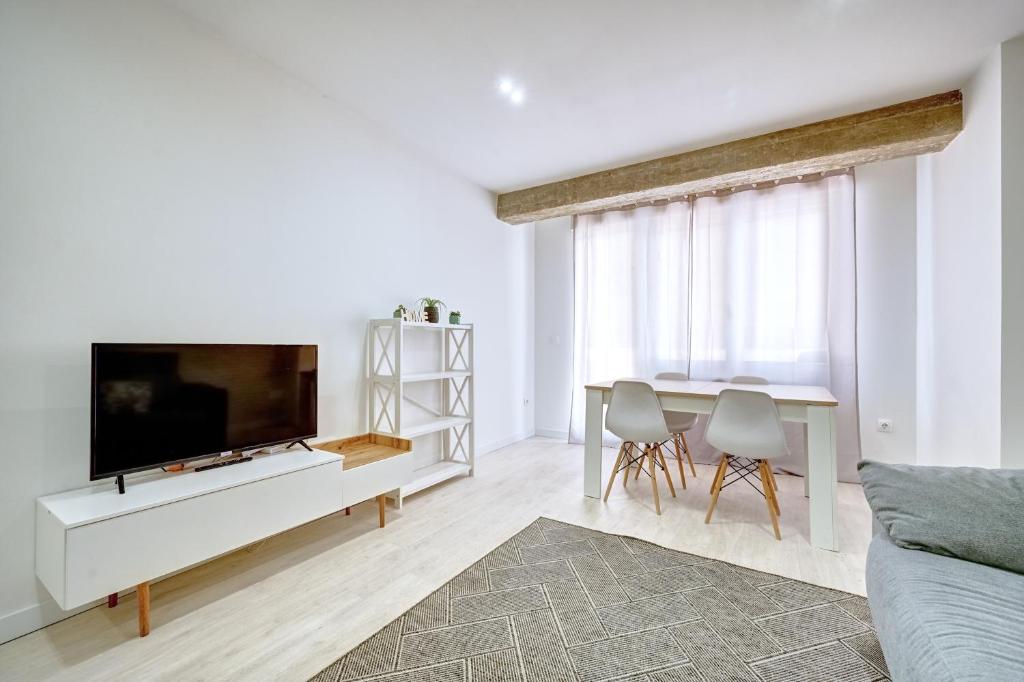 TV a/nebo společenská místnost v ubytování Apartamento Las Terrazas del Ayuntamiento by Clabao