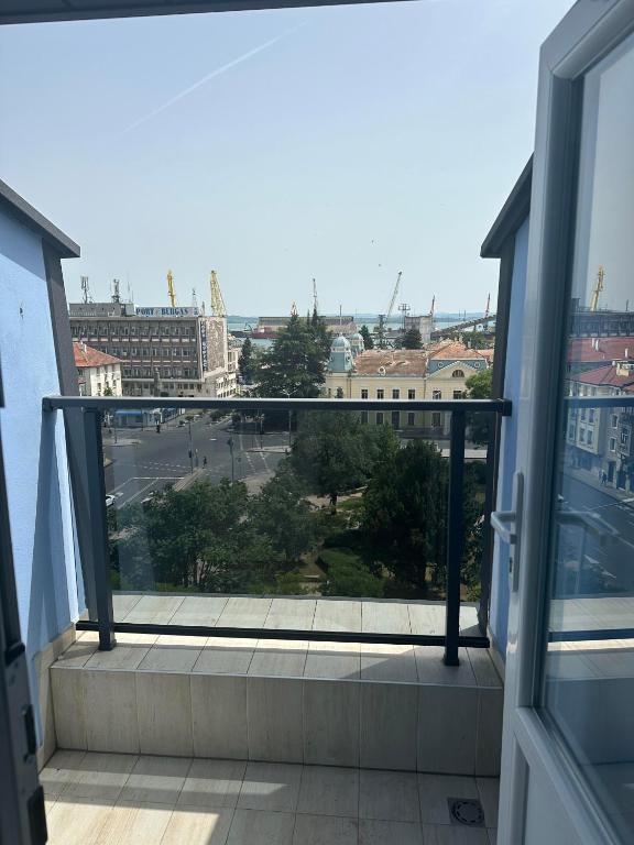 a view of a city from a balcony at Seaman's house in Burgas