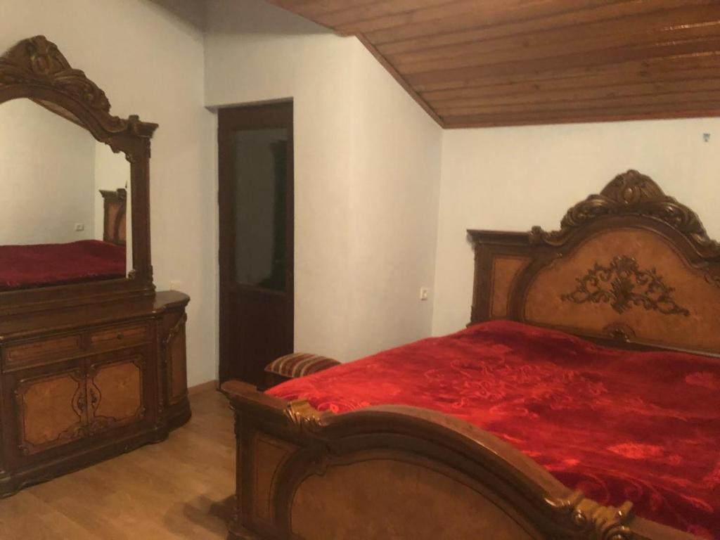 Postel nebo postele na pokoji v ubytování Aragvi Riverside