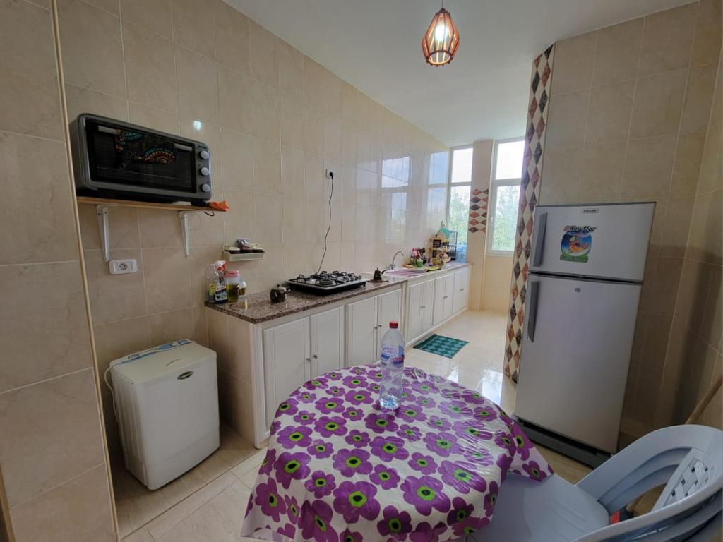 Kuchyň nebo kuchyňský kout v ubytování Maison de vacance climatisée bien équipée