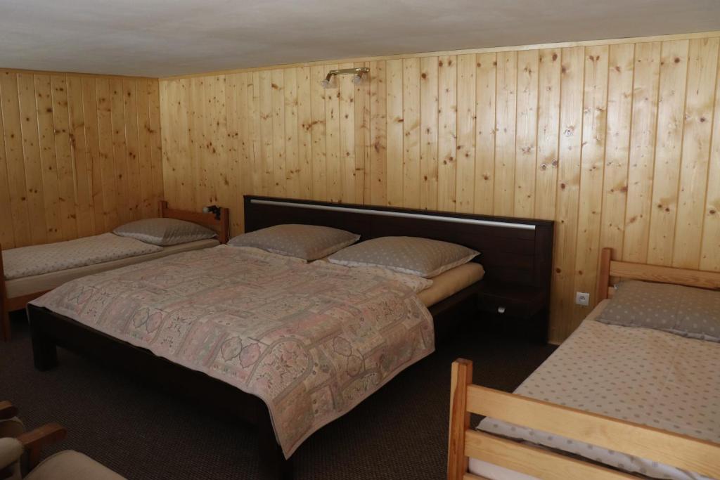 Postel nebo postele na pokoji v ubytování Hostinec Stará Krčma