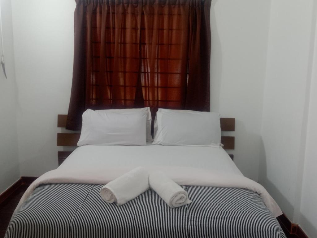 Katil atau katil-katil dalam bilik di PD Bayu Beach Resort Private Service Apartment