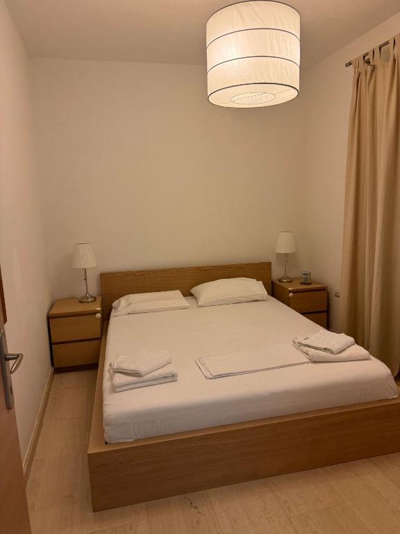 Postel nebo postele na pokoji v ubytování Aria maisonette