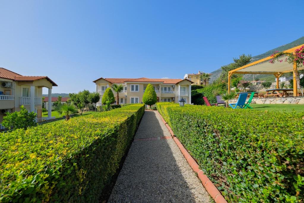 Zahrada ubytování Larimar Suite Hotel
