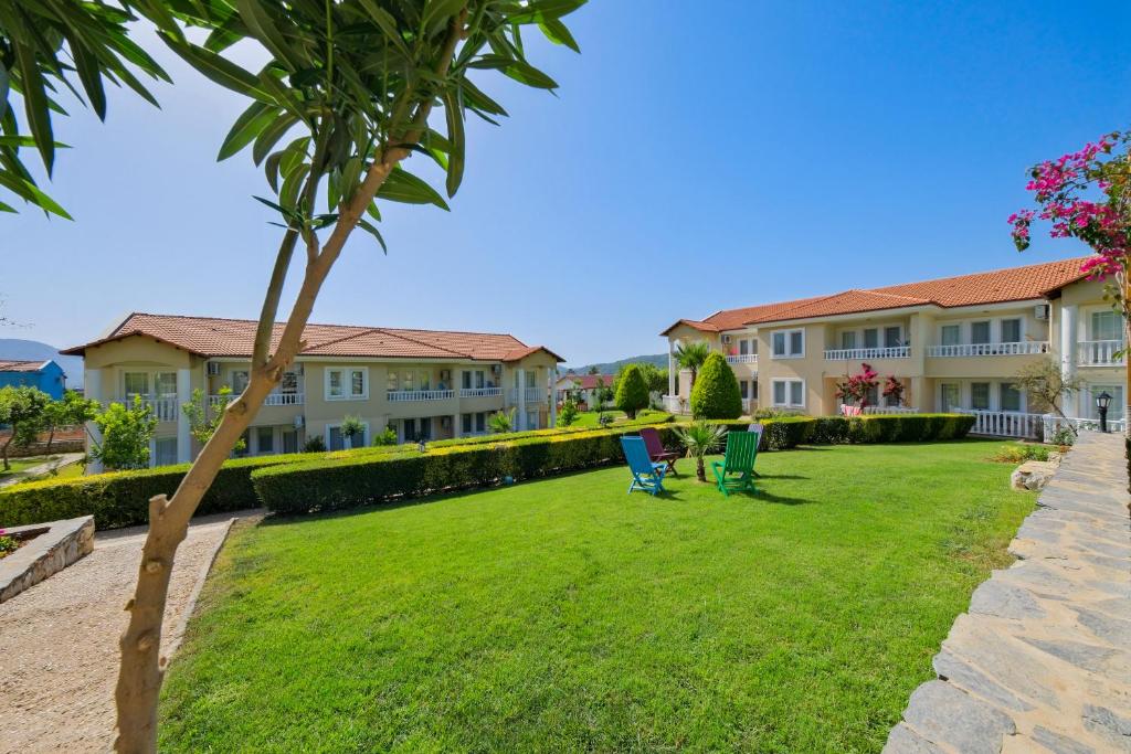 Zahrada ubytování Larimar Suite Hotel