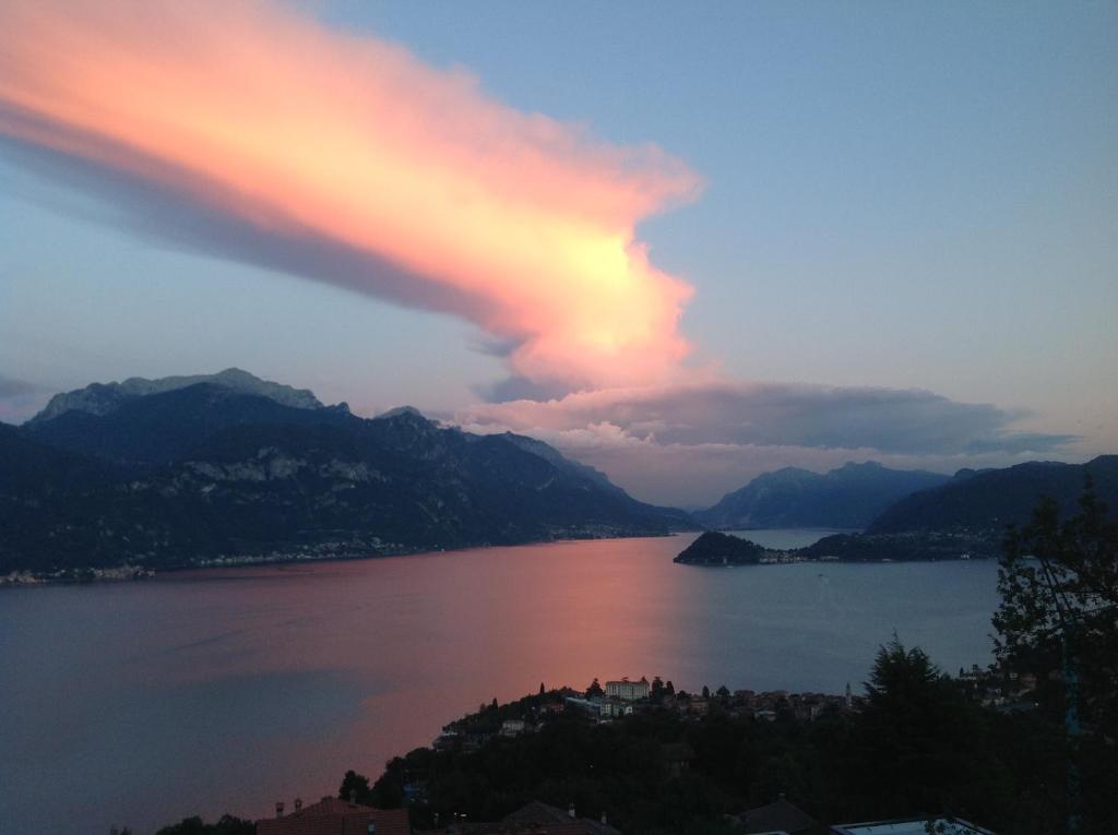 a view of a body of water with a sunset at Landscapesilvia Acqua in Menaggio