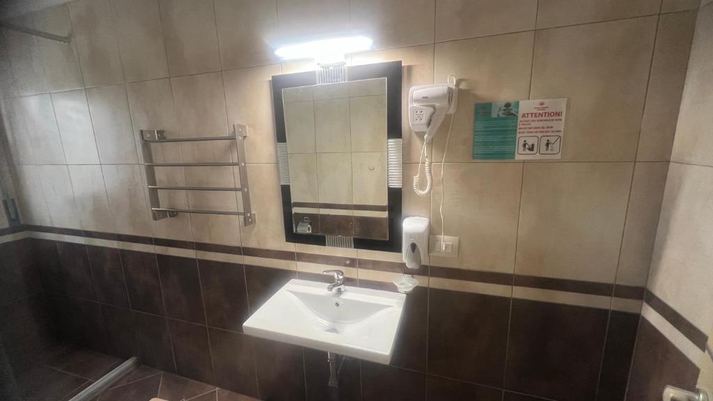 Koupelna v ubytování Sunrise Hotel Cameria