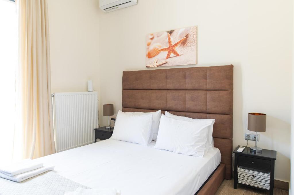 Postel nebo postele na pokoji v ubytování Livas Relaxing Villas in Kardamena