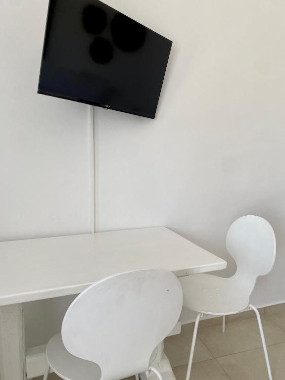 Televízia a/alebo spoločenská miestnosť v ubytovaní My Oasis Studios Mykonos